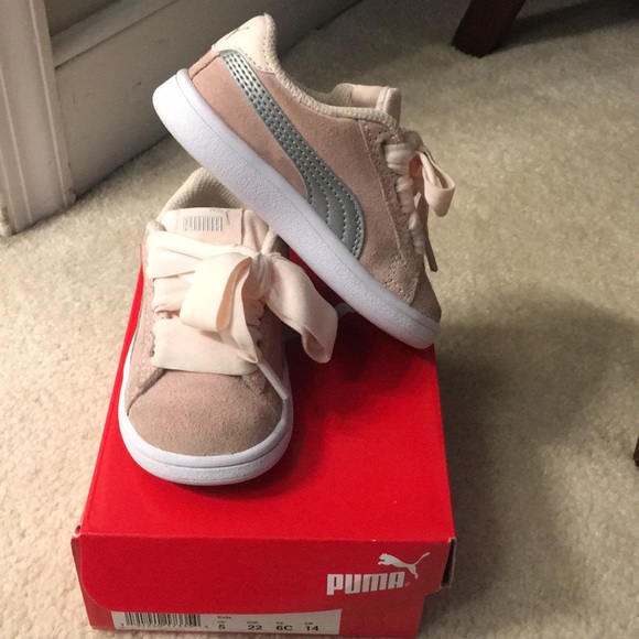 pink puma with ribbon laces